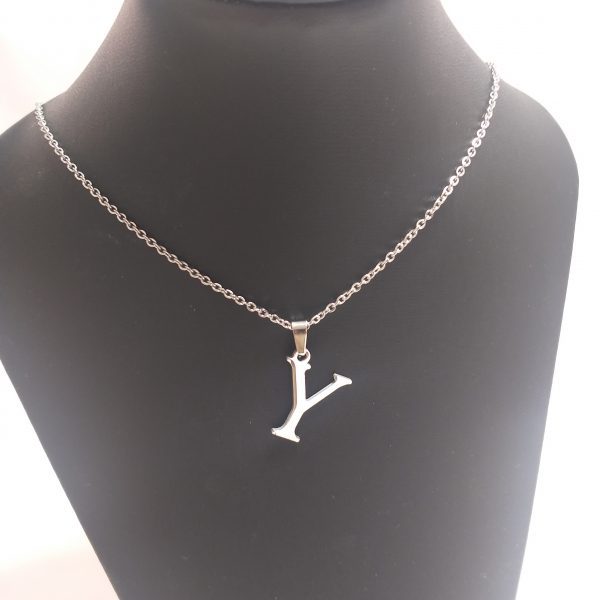 acero quirúrgico 316L.conjunto cadena con inicial.Precio por unid