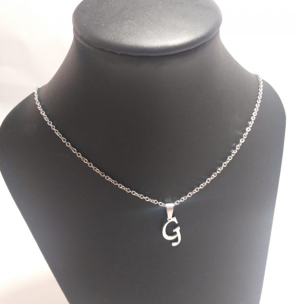 acero quirúrgico 316L.conjunto cadena con inicial.Precio por unidad.