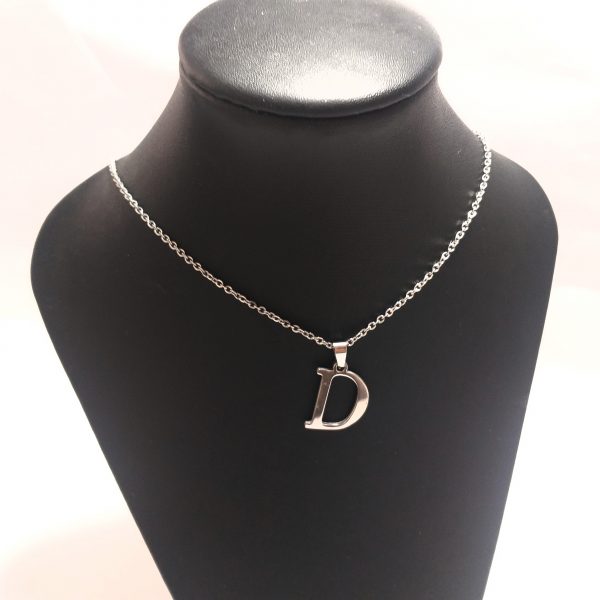 acero quirúrgico 316L.conjunto cadena con inicial.Precio por unidad.