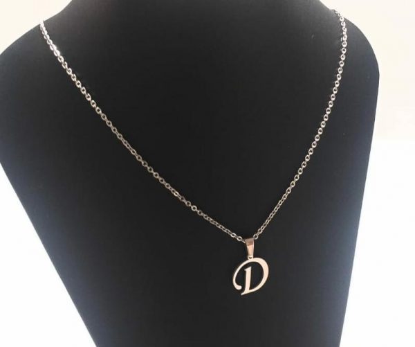 acero quirúrgico 316L.conjunto cadena con inicial.Precio por unidad.
