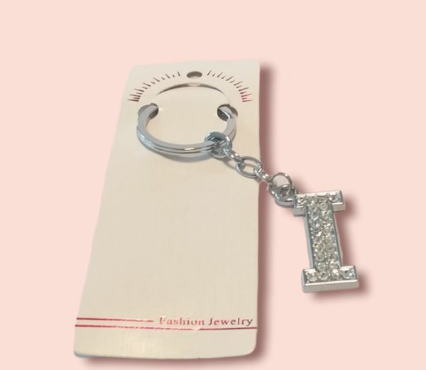 llaveros bijouterie.con strass tamaño 3.5cm letra.