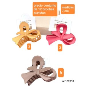Luc162810.precio conjunto de 12 broches surtidos